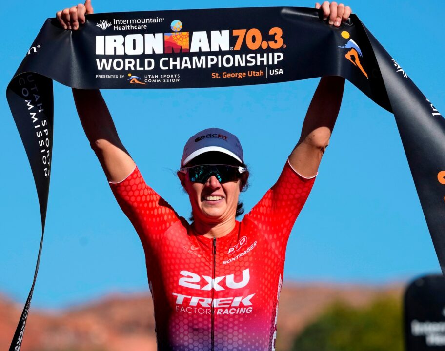 ST GEORGE, UTAH - OCTOBER 28: Taylor Knibb of the United States celebrates after finishing in first place during the IRONMAN 70.3 World Championship on October 28, 2022 in St George, Utah. (Photo by Patrick McDermott/Getty Images for IRONMAN)